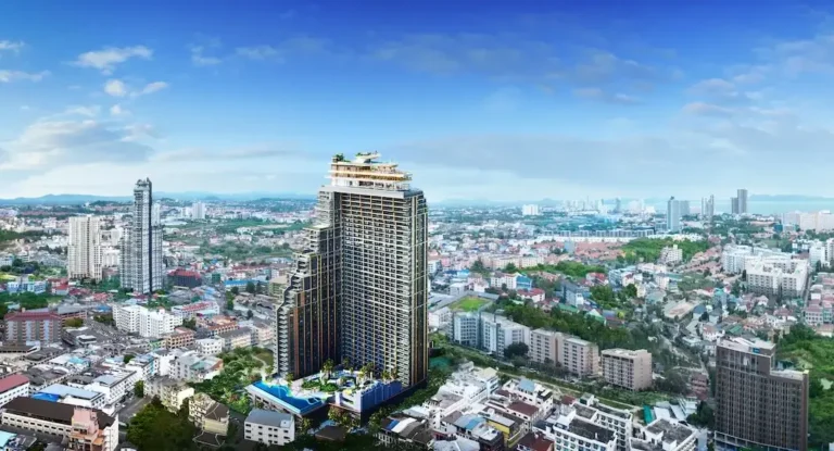 Modern residential skyscraper in the city center against the blue sky. Panoramic view of the architecture.