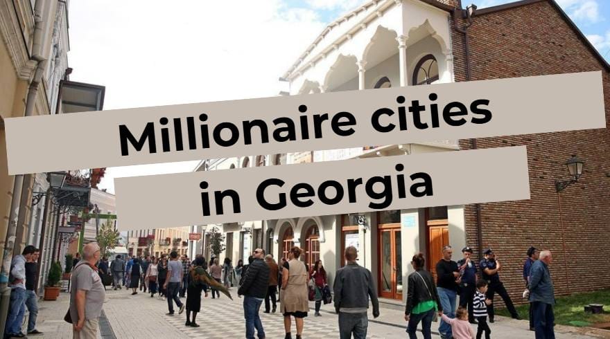Street in Georgian city with people, inscription Cities of Georgia's millions of people on the background of historical buildings.