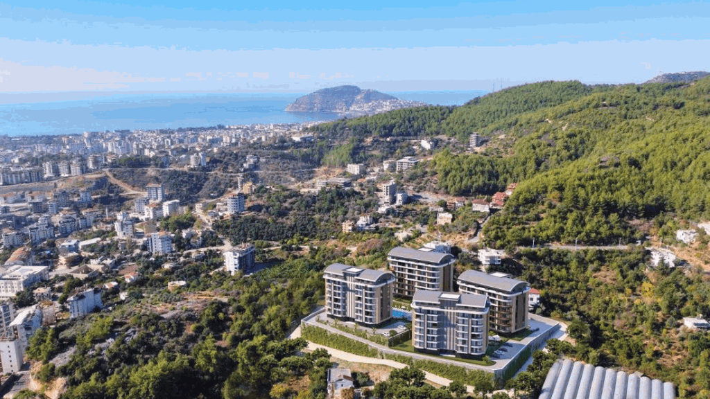 New property by the sea surrounded by greenery and cityscape with mountain and coastal views.