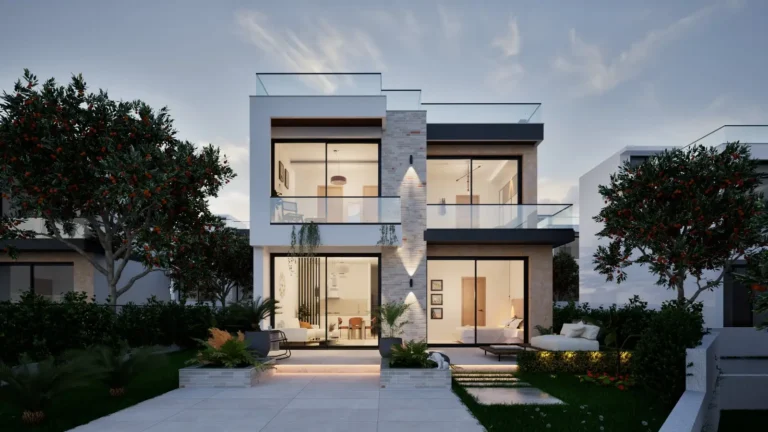 Modern two-story home with large glass windows and sunset garden.